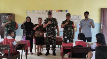 Koramil 04/Tigalingga Berbagi 100 Paket Makan Bergizi Gratis untuk Siswa SD di Juma Borno