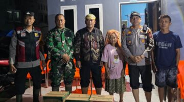 Respon Cepat Polsek Perdagangan : Salurkan Bantuan, Sigap Evakuasi Warga Terdampak Banjir di Bandar Masilam