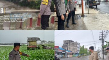 Antisipasi Banjir, Polsek Jajaran Polres Tanjung Balai Pantau Ketat Debit Air Sungai