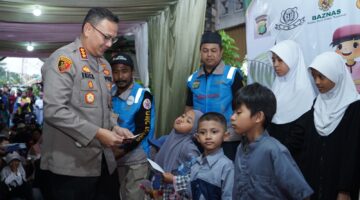 Kapolres Metro Jakarta Utara Hadiri Buka Puasa Bersama dan Santunan Anak Yatim Bersama Komunitas Ojol