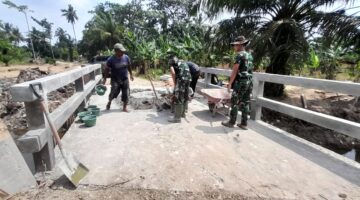 Melalui Budaya Gotong Royong, Pembangunan Jembatan TMMD 128 Pasar Rawa Hampir Tuntas