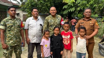 Dansatgas TMMD ke 130 Kodim 0209/Labuhanbatu, Anak Warga Minta Berpose Ria